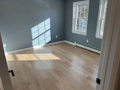 Garvey Construction, Finished bedroom with hardwood floors